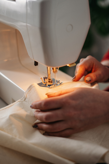 Woman sewing fabric : D.I.Y alternative fashion